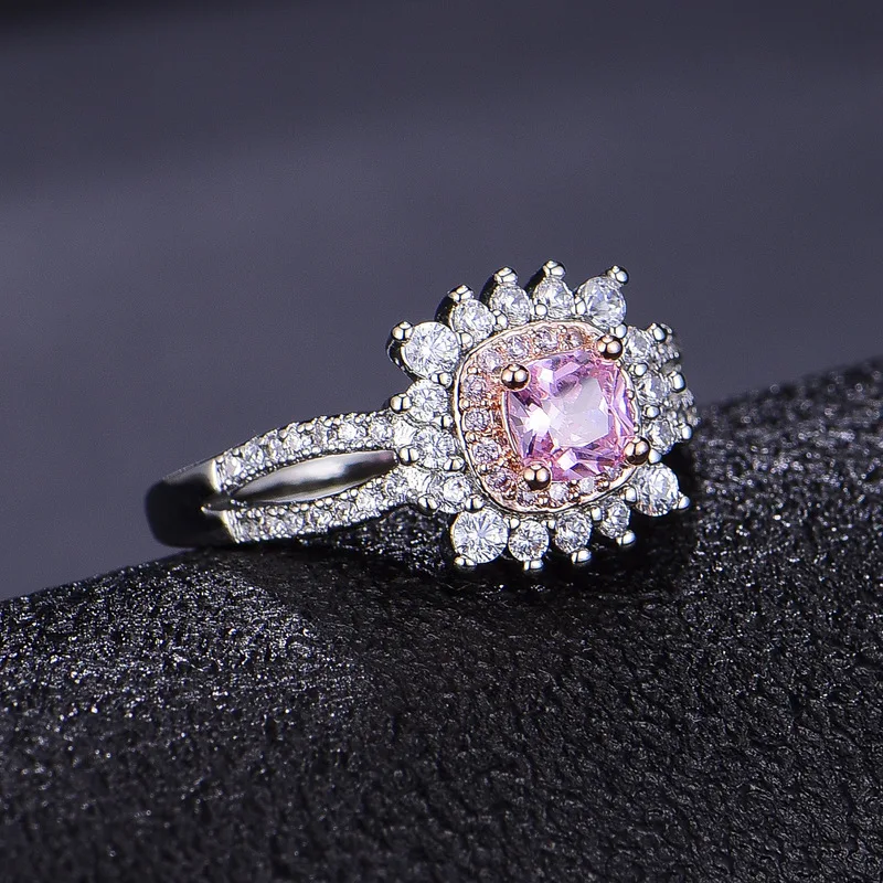New luxury full-diamond split rose gold imitation pink color gemstone women's engagement ring. Elegant jewelry.
