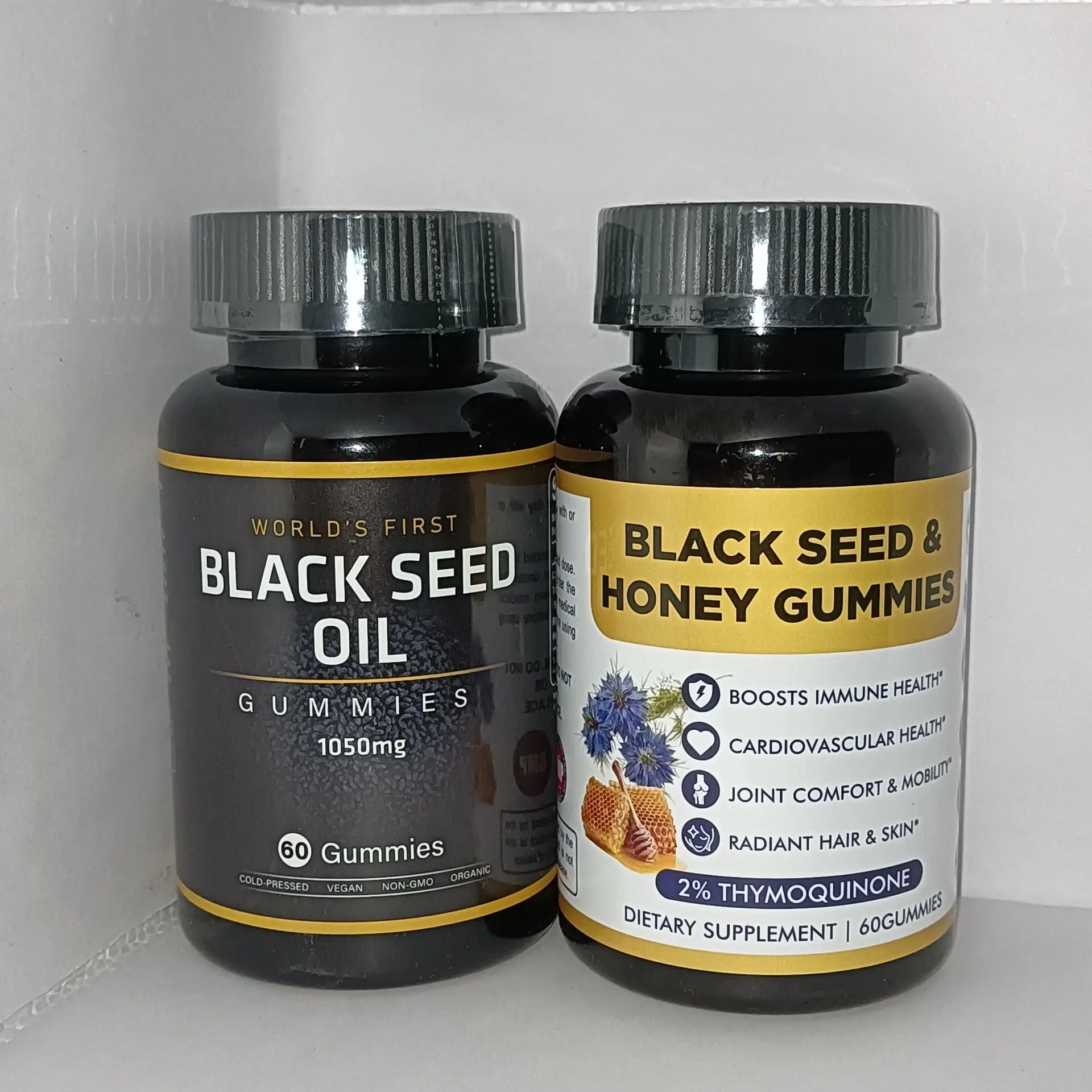 

2 bottles of black seed oil gummies honey to improve physical condition, shape and antioxidant dietary supplement