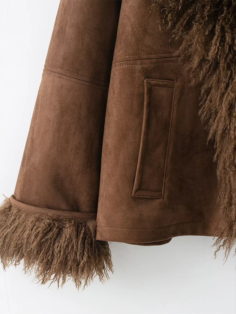 سترة نسائية جديدة على الطراز الأوروبي عصرية ومتعددة الاستخدامات ذات لون سادة وتأثير من الفرو الصناعي وأكمام طويلة.