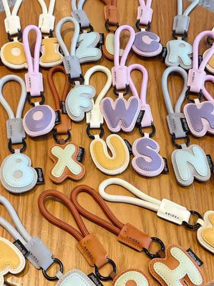 Fashion Creative 26 Letter Leather Bag Pendant Accessory Cartoon Keychain Hanging Chain Hanging Rope For Men And Women Wholesale