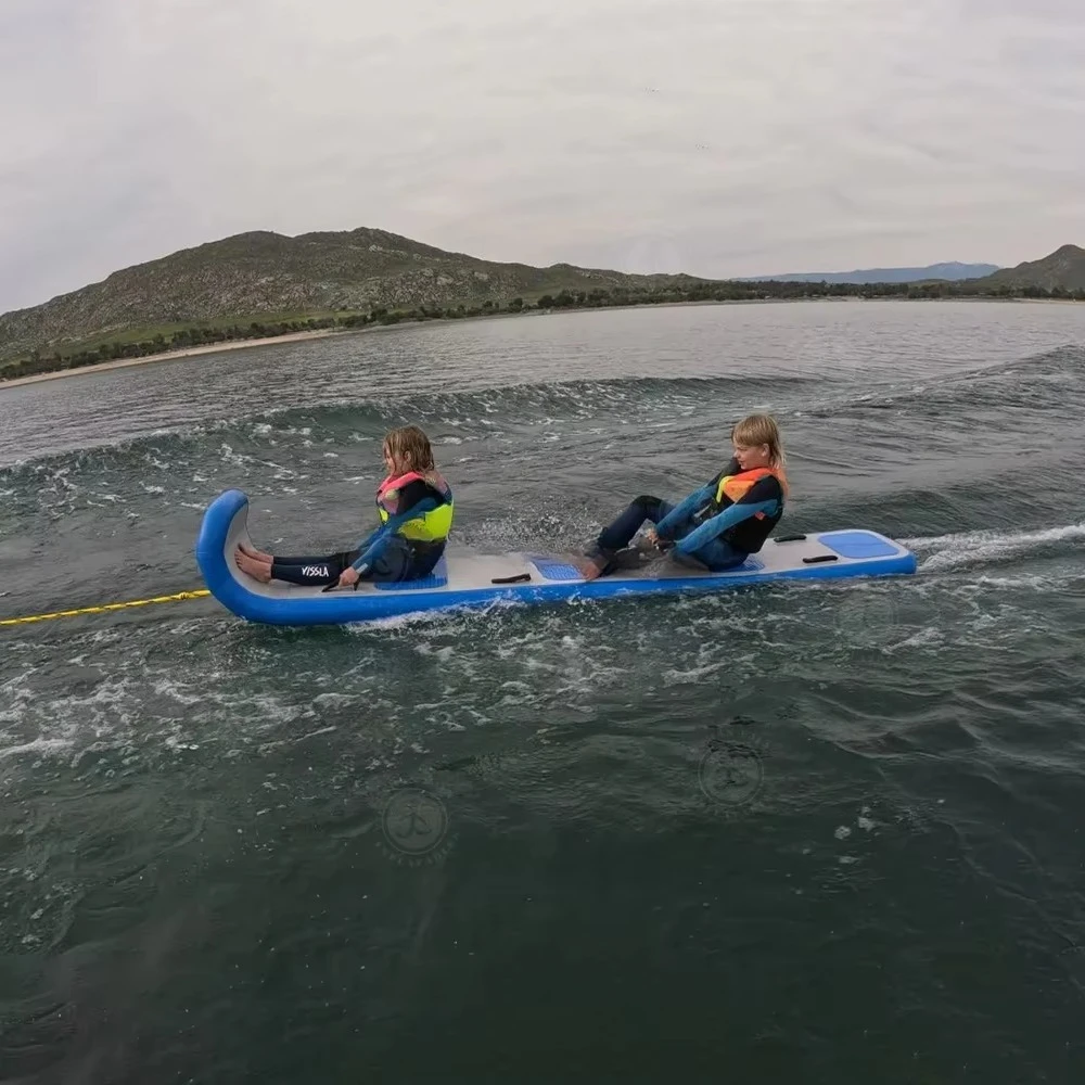 Extra long inflatable PVC toboggan for water skiing and skiing, surfing and skateboarding
