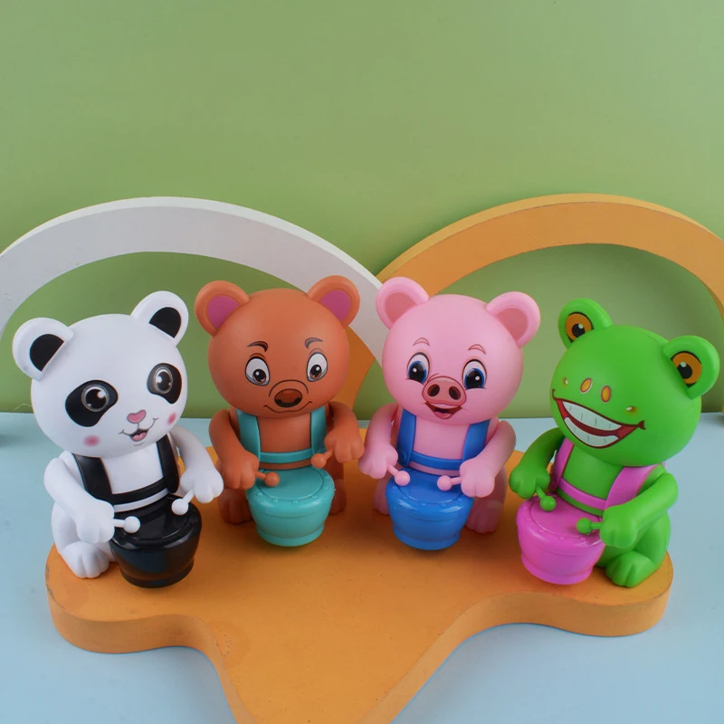 1 pz creativo carino Drumming maialino orso giocattolo nuovo giocattolo a orologeria cartone animato per bambini avvolgimento divertente piccolo animale giocattolo per bambini regalo di compleanno