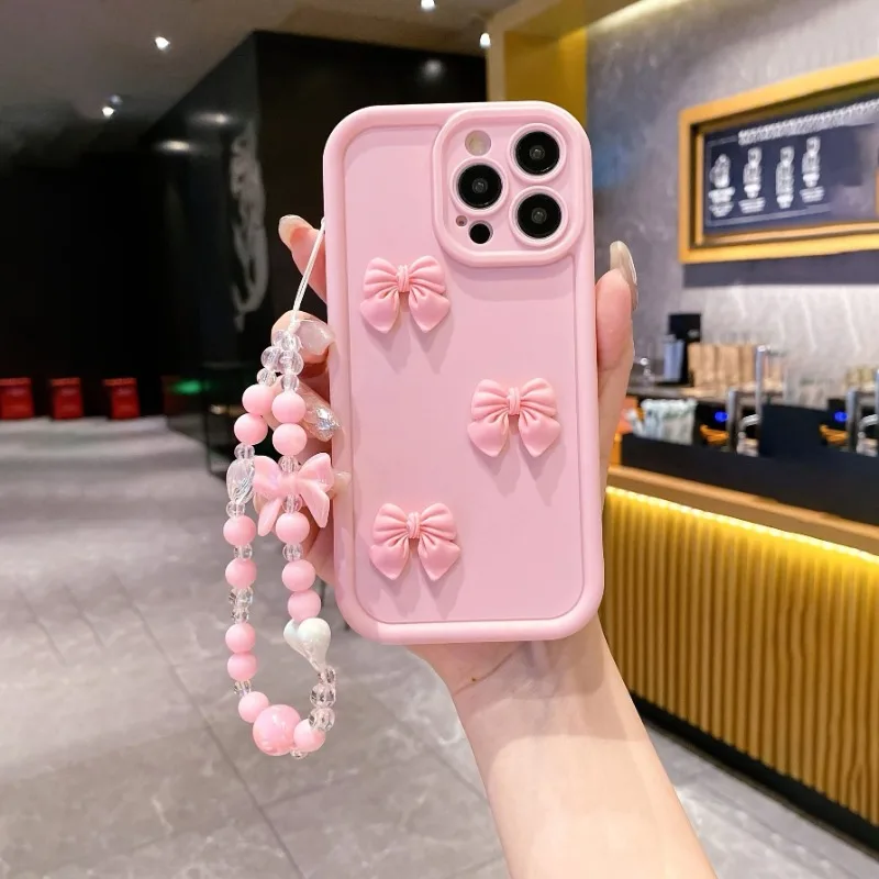 2Pcs Three-Dimensional Bow with Bracelet,Shock-Absorbing Pink Phone Case Suitable for Apple 16PROMAX/15PLUS/14PRO/13, iphone 12