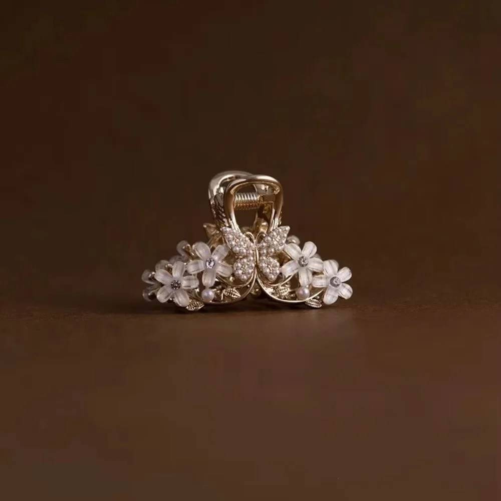 Gold Tone Triple Prong Claw Clip with Mini Floral Elements and Winged Motif Rhinestones Simulated Pearl Beads Elegant Accessory