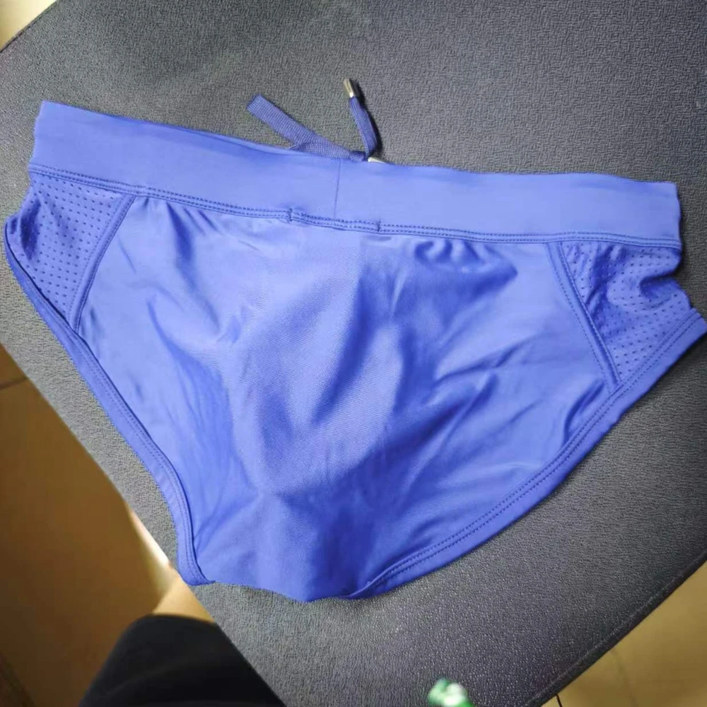 Real Photos of Cross-border New Men's Solid Color Swimming Trunks Mesh Splicing with Cup Size Sexy Three-Dimensional Beach 380-1