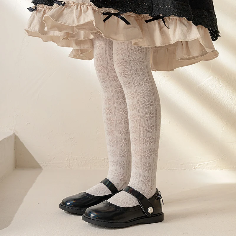 

A pair of soft and comfortable summer girls' white mesh tights with a sweet and versatile style