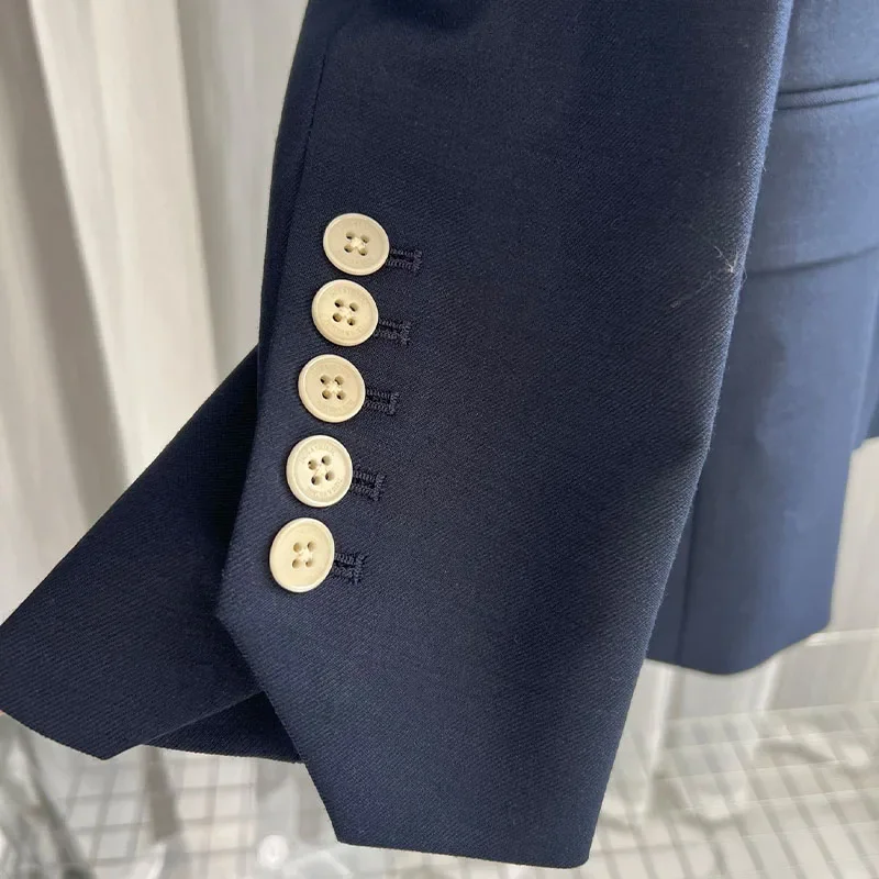 Giacca da donna elegante con risvolto a maniche lunghe doppiopetto blu navy da donna di inizio primavera