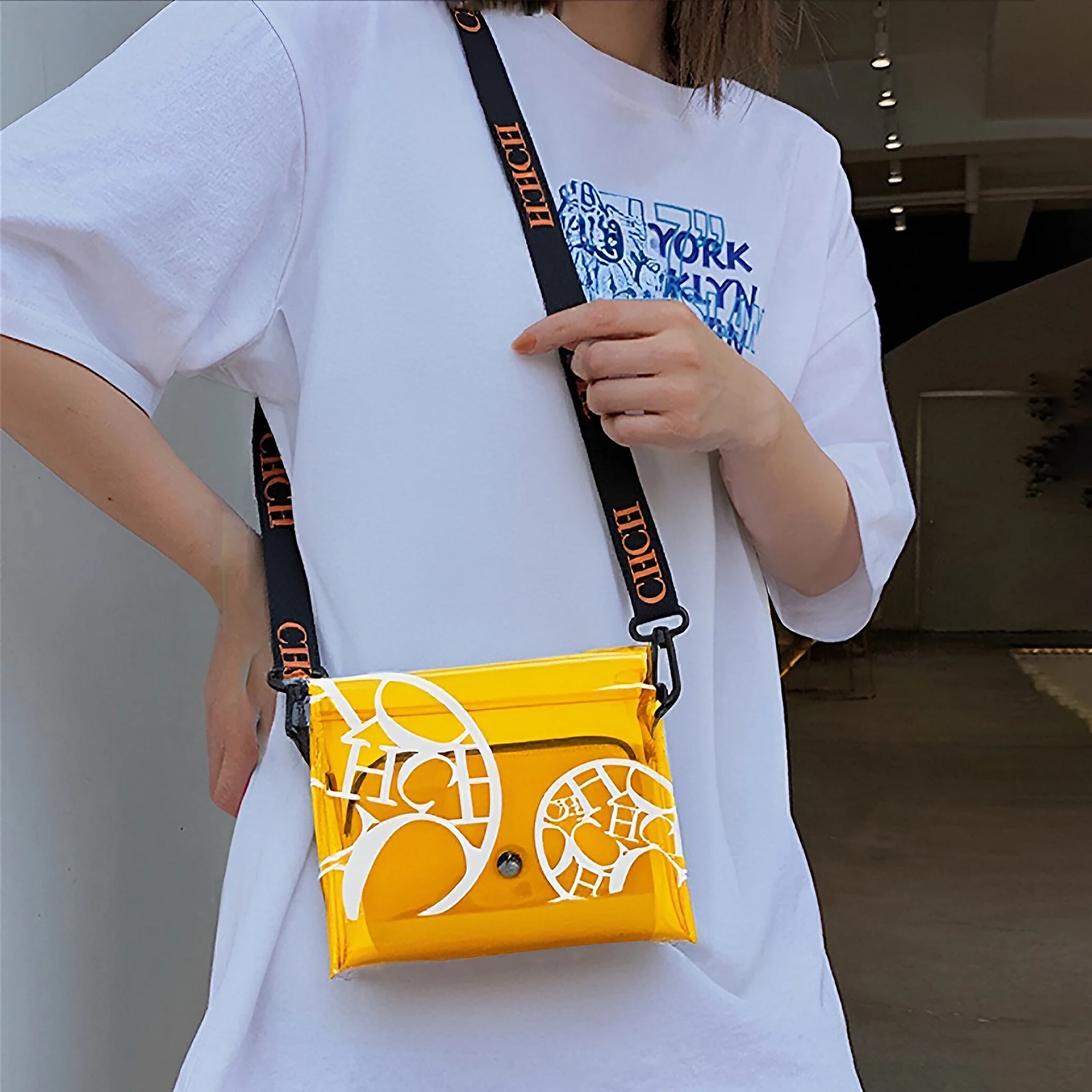 Vibrant Yellow Transparent Tote Eye - Catching Design with Artistic White Patterns, Sleek Functionality and Chic Metal Accents