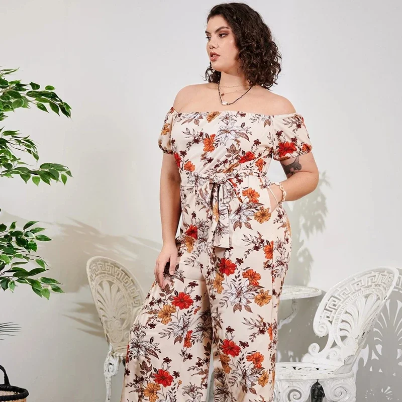 Plus Size Floral Print Eleganckie letnie kombinezony damskie z ukośnym dekoltem i krótkim rękawem z szerokimi nogawkami Casual Boho Jumpsuits Duży