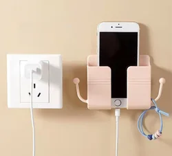 1Pc White Punch Free Wall Mount Phone Plug Holder Mobile Phone Charging Stand Air Conditioner TV Remote Control Storage Box
