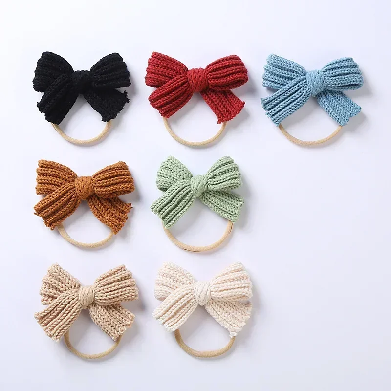 1 pz carino maglia di lana Bowknot fascia elastica per capelli infantile tinta unita fiocchi all'uncinetto fascia in Nylon copricapo per bambini regalo di compleanno