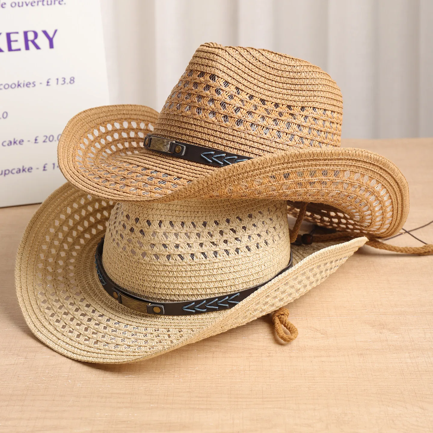 Hollow-Out Breathable Straw Western Cowboy Hat, Unisex Vintage Wide-Brim Sun Hat, Foldable Sun Protection Western Cowboy Hat with Windproof Strap for Beach, Seaside, Grassland Outings, and Vacations, Available in Multiple Colors