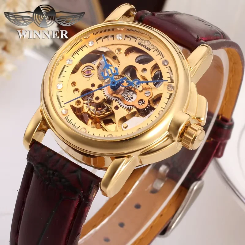 T-winner Watch Hollowed-out Round Crystal scale Blue hands Mechanical Watch Belt Wrist Watch Gold women's Watch