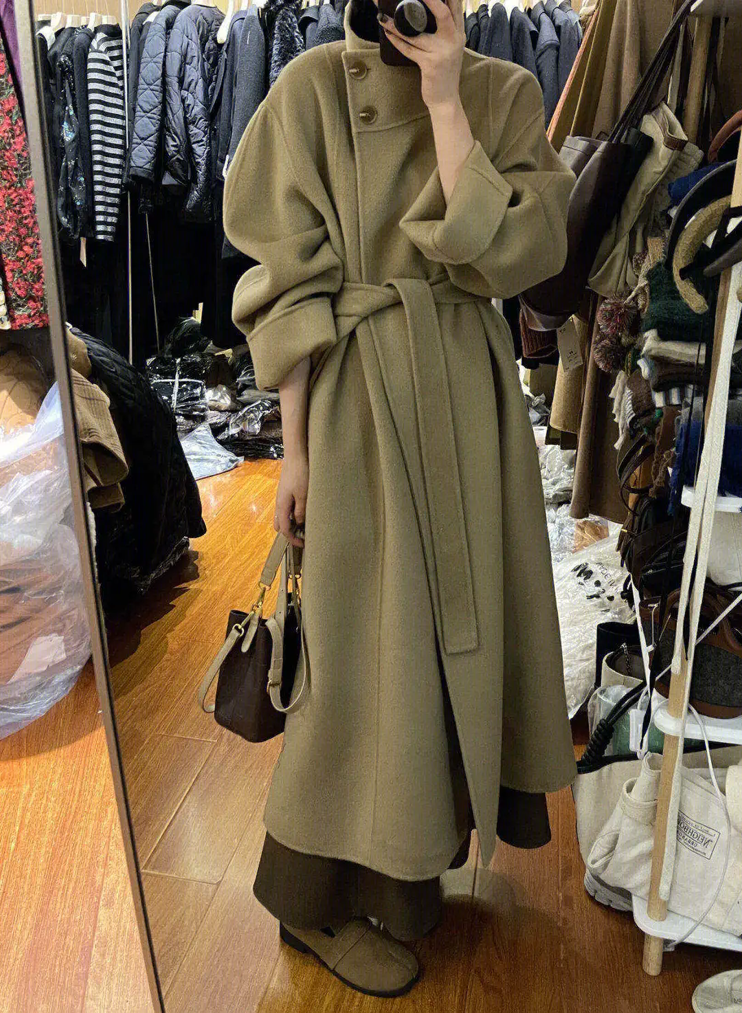 

Шерстяное пальто Kanmile для женщин, средней длины, с элегантным дизайном, осеннее, новая модель