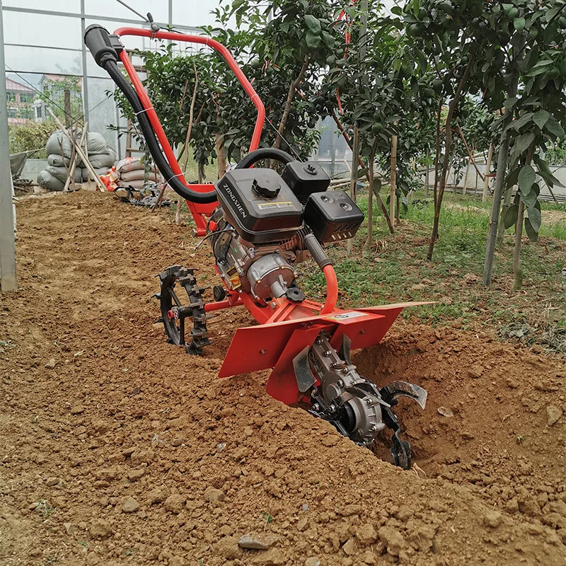 Hand-held trencher Orchard vegetable field soil opening deep groove rotary tiller Weeding micro-tiller