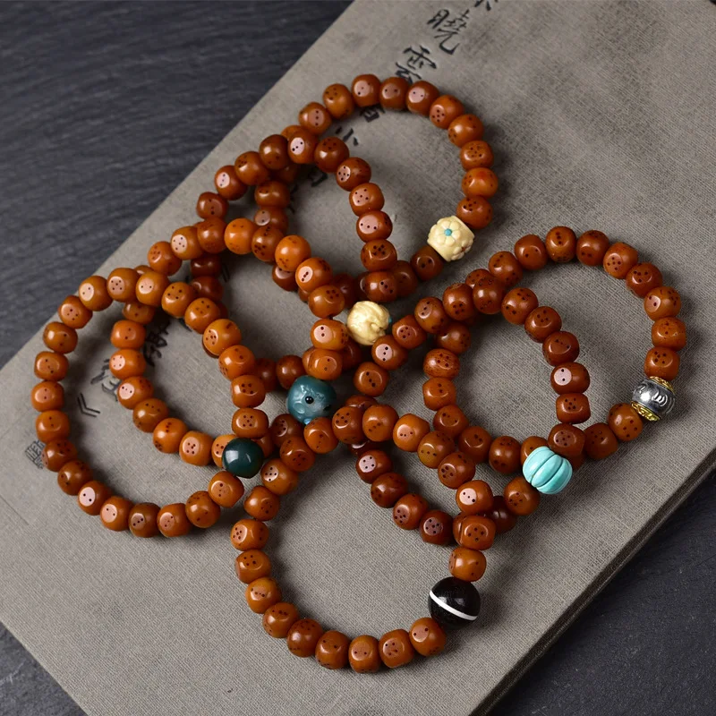 

Браслет из натуральных старинных костяных бусин (костяных бусин из слоновой кости), резные вручную, в этническом стиле, в виде кубиков, в стиле тибетских буддийских бусин, розарий, бусины-бочонки, культурные игрушки