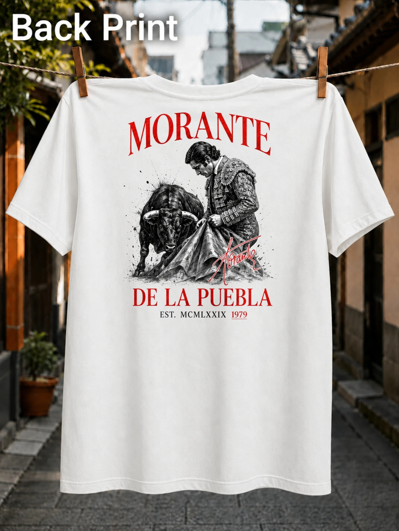 Morante De La Puebla with grayscale matador charging bull red serif text signature est MCMLXXIX and  Unisex All T-Shirt