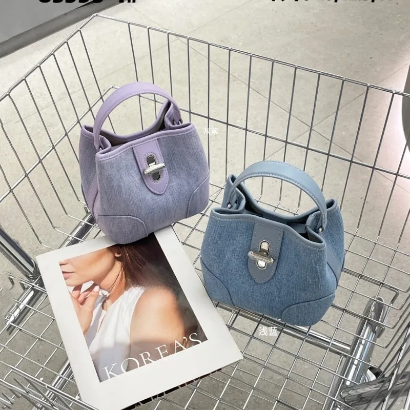 

Super fire denim bucket bag women's 2026 new high-end sense versatile exquisite vegetable basket cross hand carry small bag