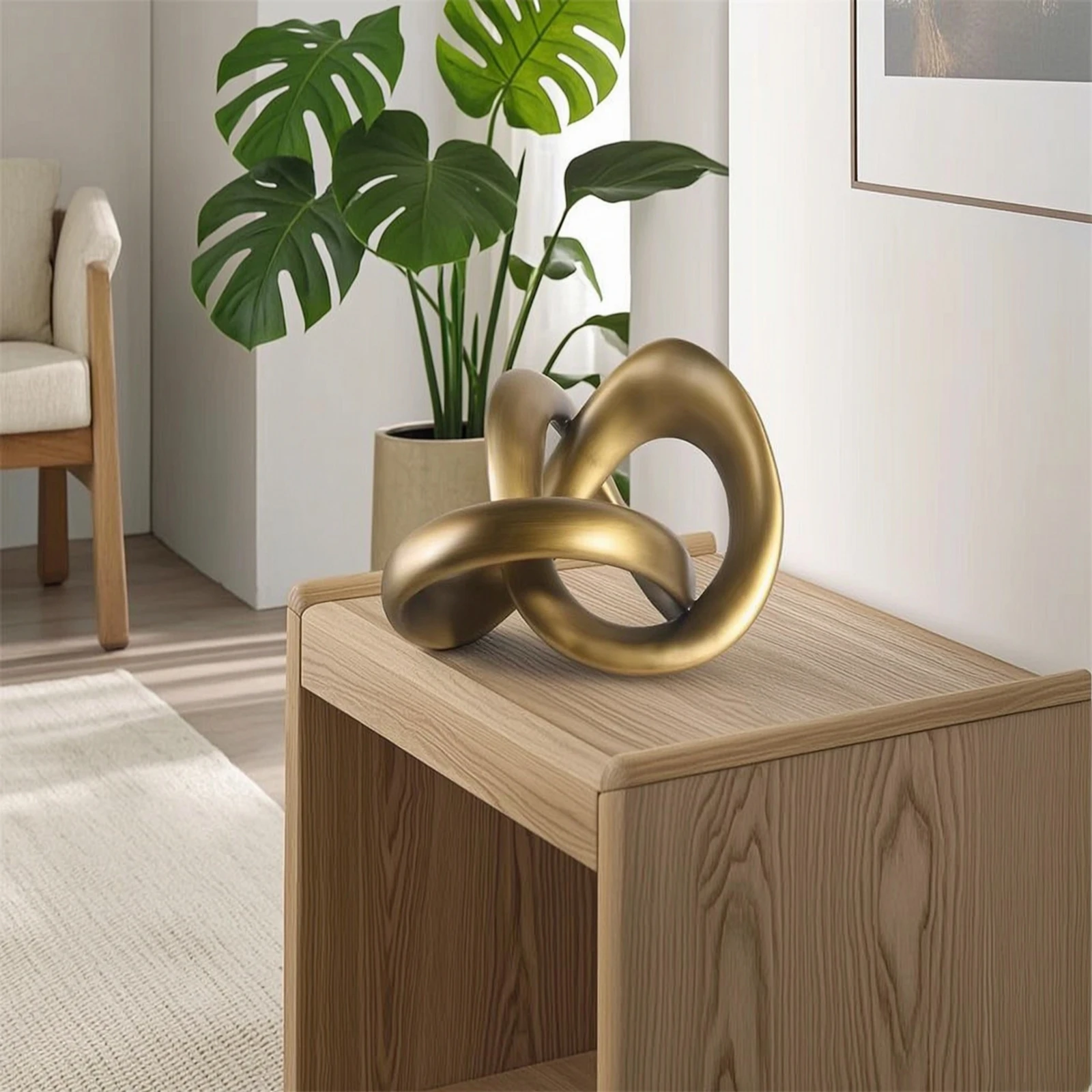 Tabletop Sculpture with Twisted Loop Gold Abstract Loop Statue Twisted Sculpture Luxury Polished for Interior Designers