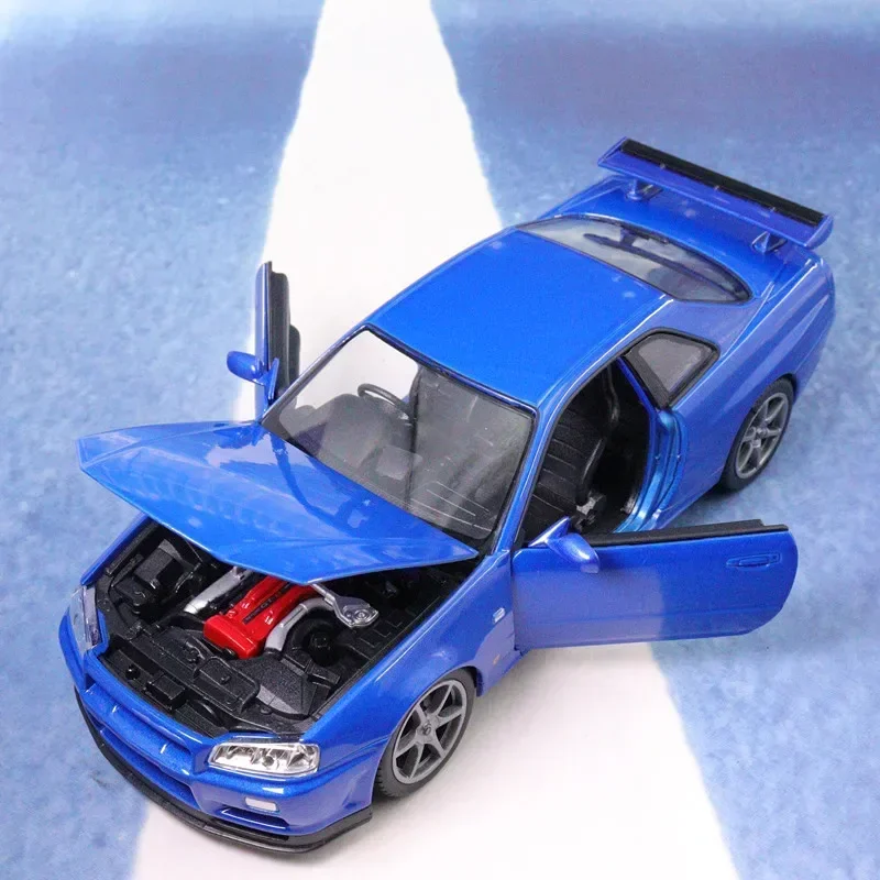 WELLY 1:24 Nissan Skyline GT-R R34 High Simulation Diecast Car Metal Alloy Model Car Children\'s toys collection gifts B236