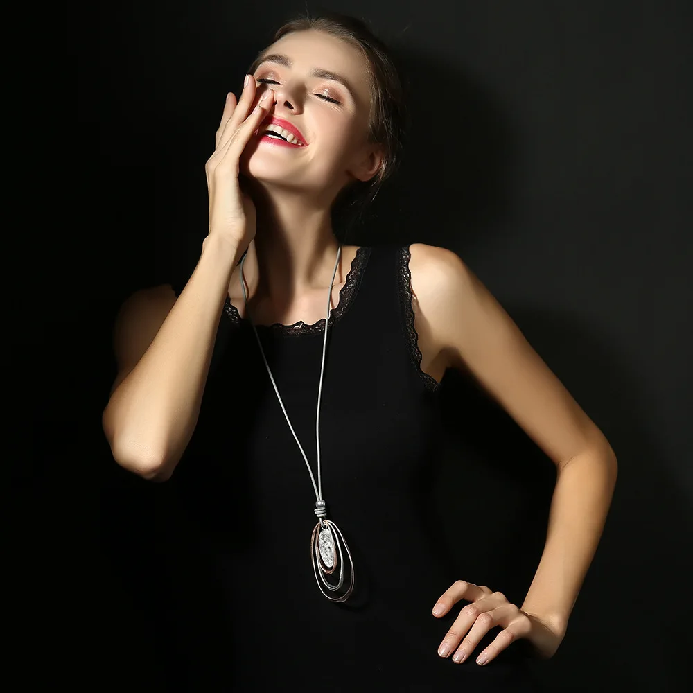 Sweater chain popular fashion simple European and American geometric oval pendant women's multi-level long necklace