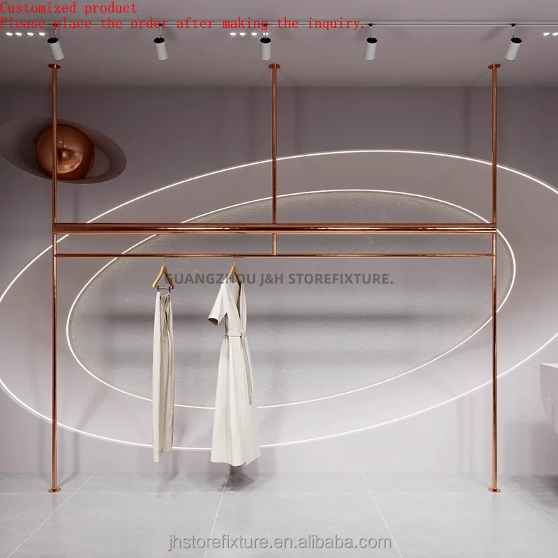 

Customized Rose Gold Cloths Rack Wall-mounted Garment Store Display Shelves Shop Display Stand for Window Show
