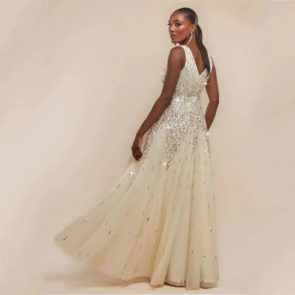 드림 베이지 우아한 이브닝 드레스 바닥 길이의 튤 소재 브이넥 민소매 프롬 드레스 스팽글 베스티도스 데 피에스타 맞춤 제작