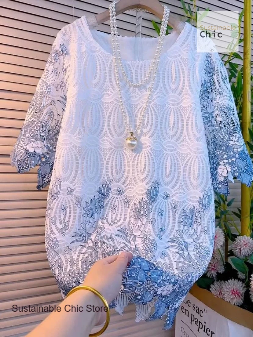 

French fashion design sense crocheted hollow short-sleeved T-shirt female summer new loose slim unique beautiful round neck top.