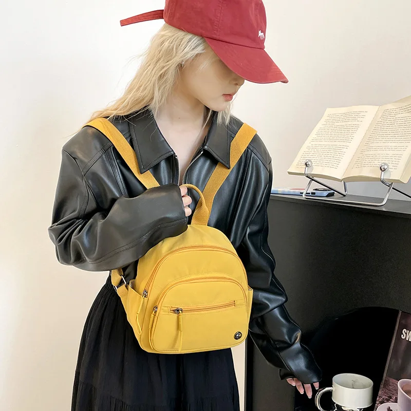 Mini backpack, simple and lightweight for women, water-resistant nylon fabric for moisture-proof travel