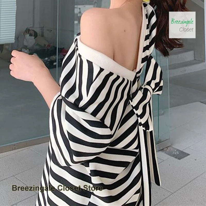 フレンチスタイルのリボンバックレスVネックストライプドレス女性の夏の新しいファッションルーズプラスサイズカジュアルジョーカースリムTシャツスカート。