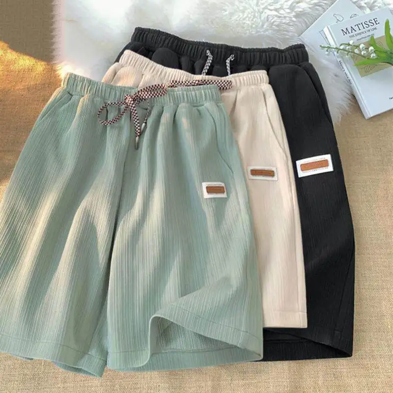 

Мужские летние спортивные шорты из ледяного шелка, эластичные, свободного кроя, пляжные, длиной до колена, быстросохнущие, из мягкого полиэстера, молодежные, модные