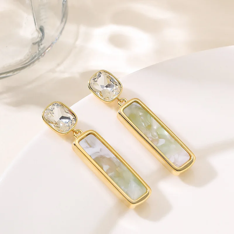 

Fashionable, exquisite and personalized, simple and long tassel earrings inlaid with zircon plates, elegant and slimming earring