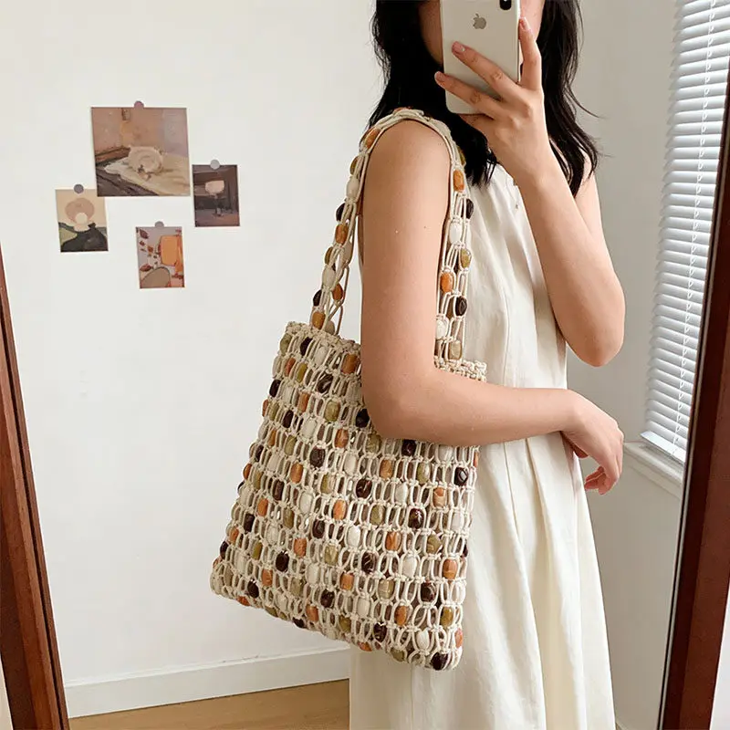 Vintage Handgefertigte Perlen-Handtasche Nischen-Designer Luxus Ausgehöhlte Bucket Bag Neue Sommer Damen Strand-Urlaubstasche – Detail 22