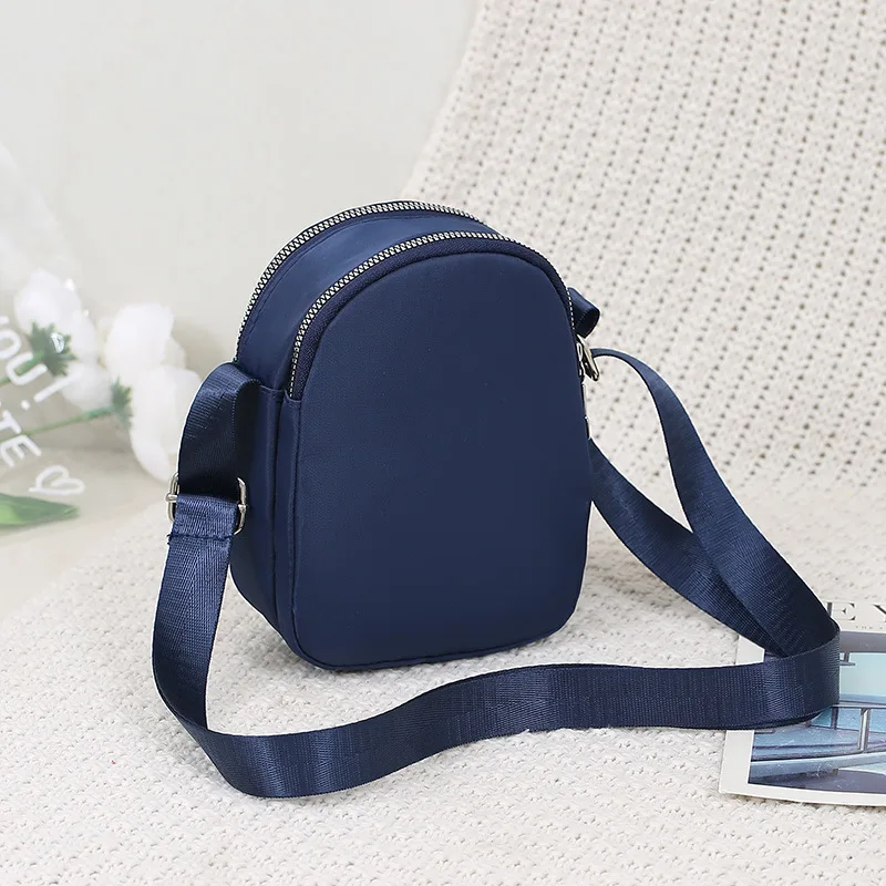 Mobile phone bag women\'s crossbody 2023 new mini small bag canvas bag trendy versatile vertical shoulder key coin purse