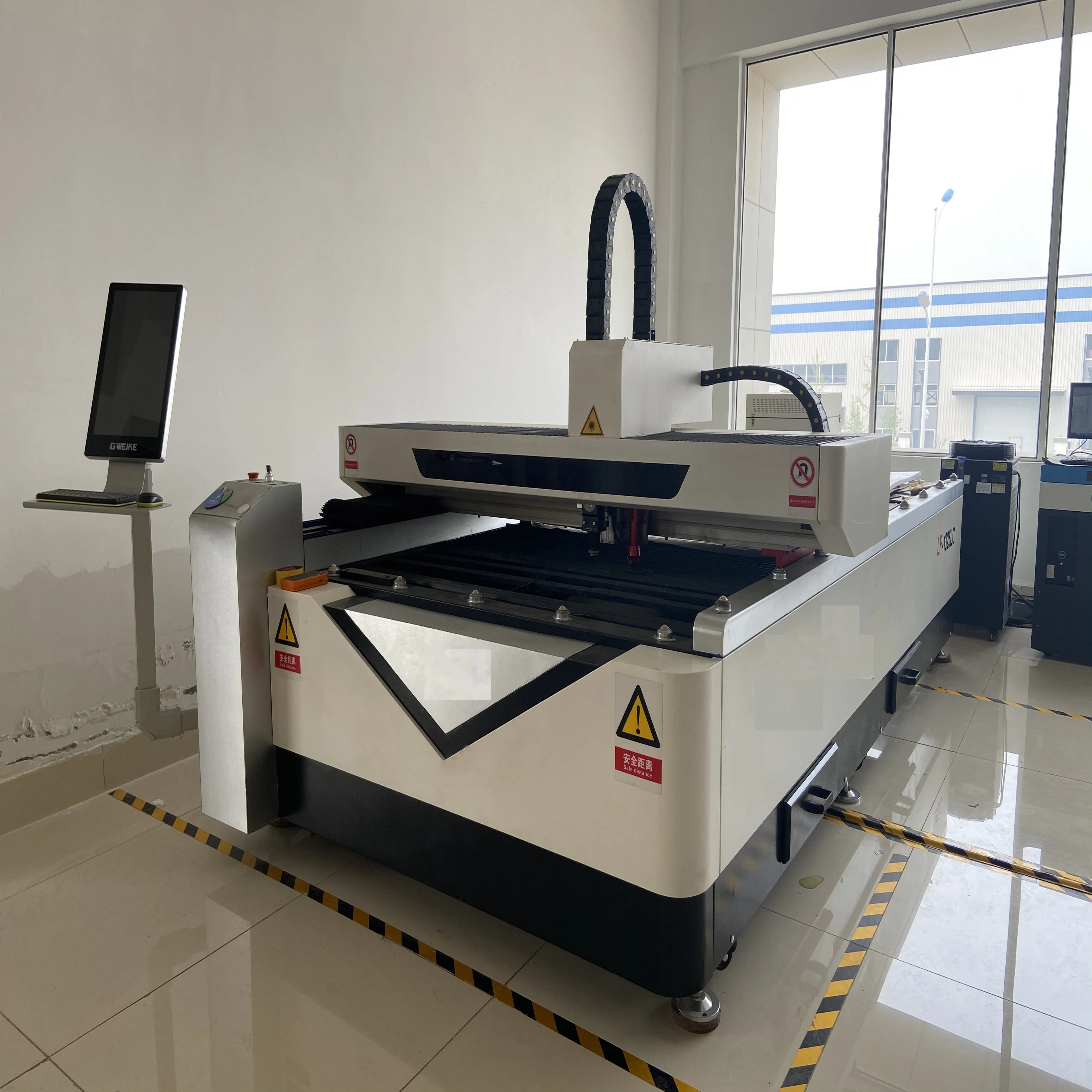 Metal and Non metal Material High Precision Hot Sale Double Head Fiber and Co2 Laser Cutting Machine for sale