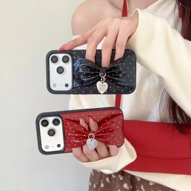 

Korean Polka Dot Cute Bowknot Wristband Phone Case For iPhone 17 Pro 16 15 14 Pro Max Hard Protective Cover Lovely Shockproof Ca
