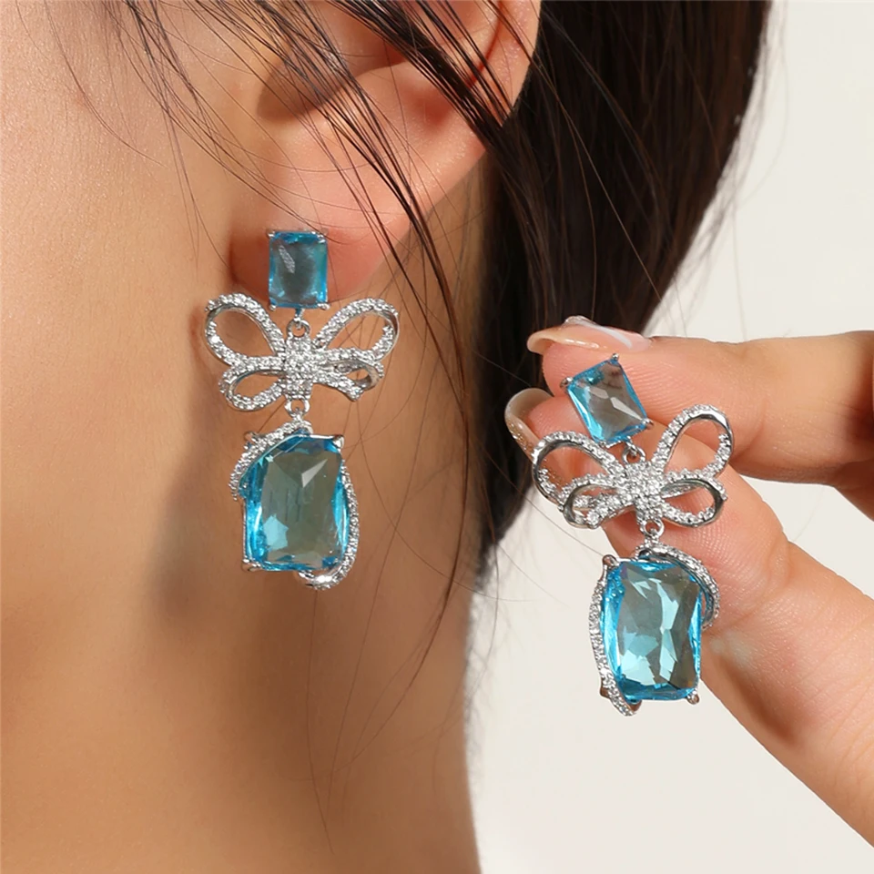 ZAKOL Exquisite handgemachte eingelegte Zirkon Schleife Schmetterling baumelnde Ohrringe für Frauen große rosa blaue Kristall CZ Hochzeit Schmuck