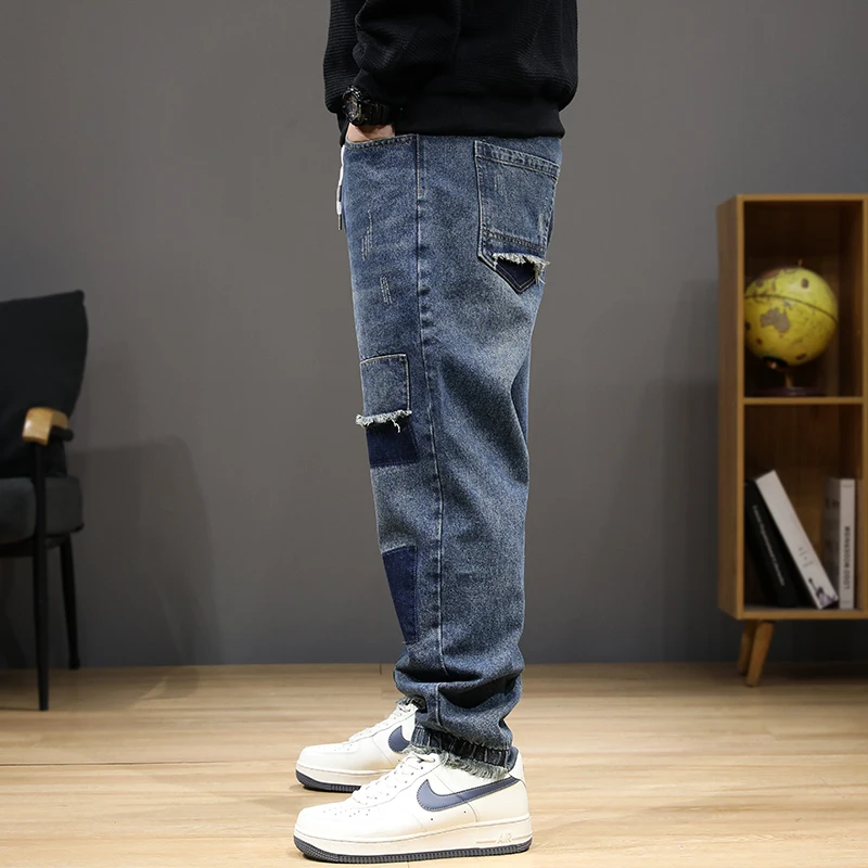 عداء ببطء الجينز الرجال الدنيم السراويل حجم كبير 8XL موضة المرقعة الجينز عادية مرونة الخصر الدنيم السراويل الذكور سراويل كبيرة الحجم