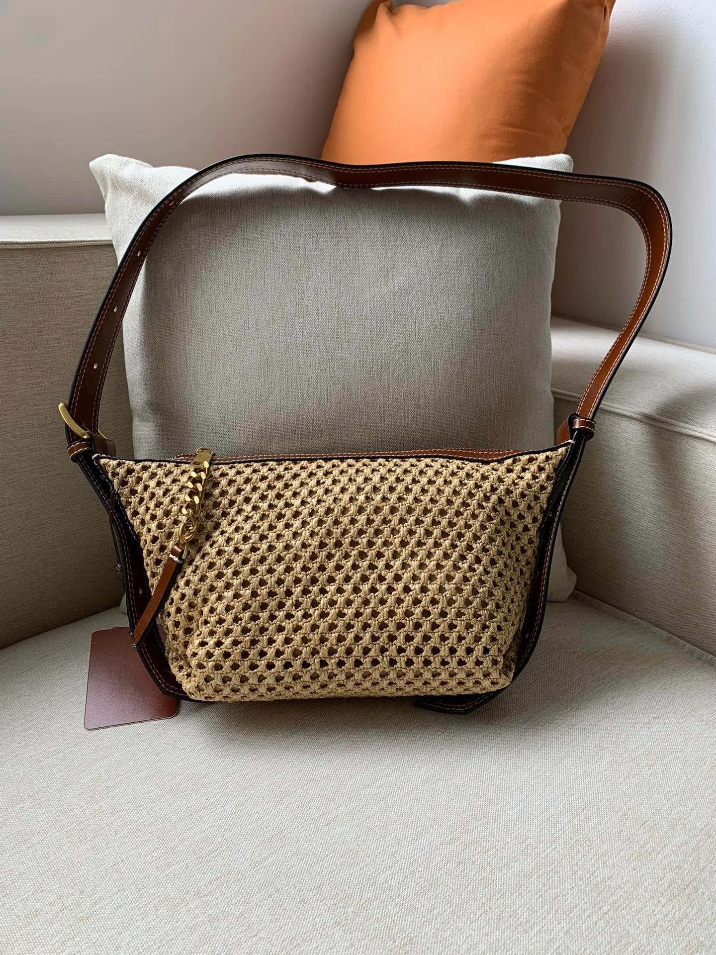 Ladies' Bag 2024 New Grass Weaving Hollow out Casual Single Shoulder Cross Shoulder Dumpling Bag