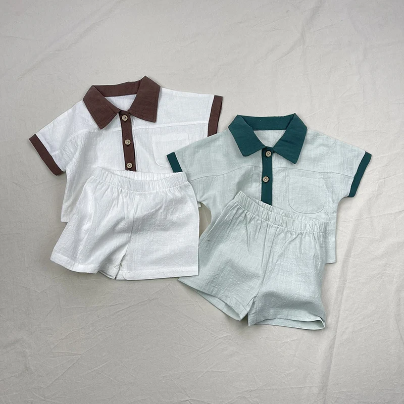 

Новый летний комплект одежды для малышей 2026: хлопковая рубашка с коротким рукавом + шорты для мальчиков и девочек