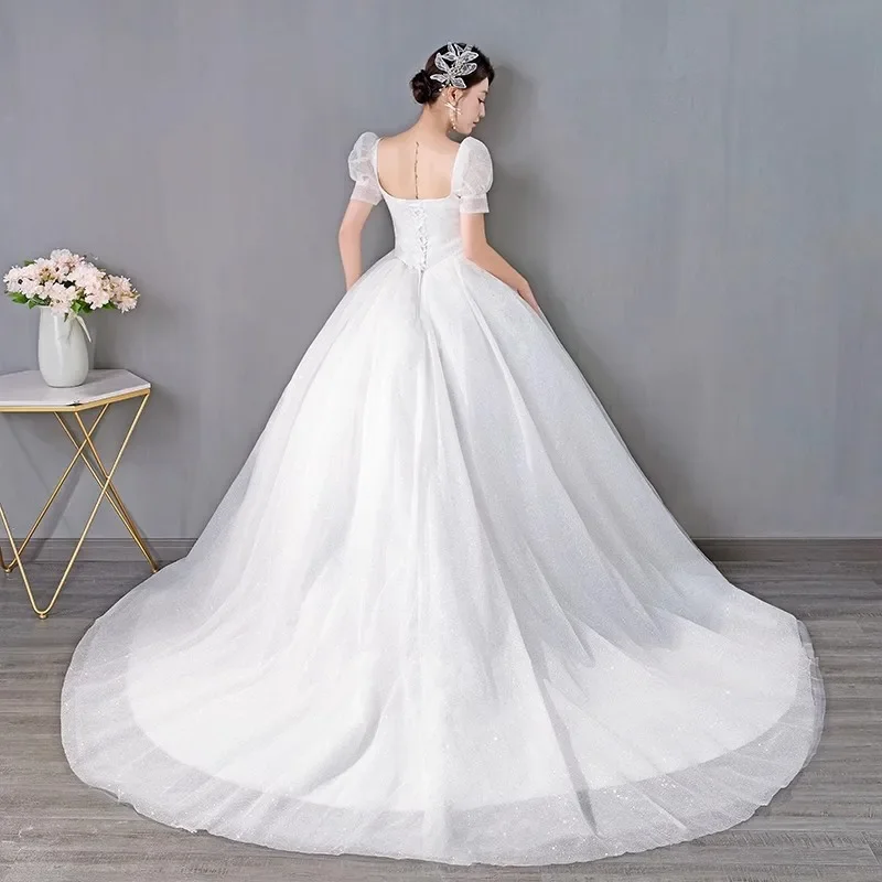 Vestidos de novia de tul ostentoso blanco, cuello cuadrado, mangas cortas, Princesa, longitud hasta el suelo, talla grande, vestido de baile de novia Simple, XN056