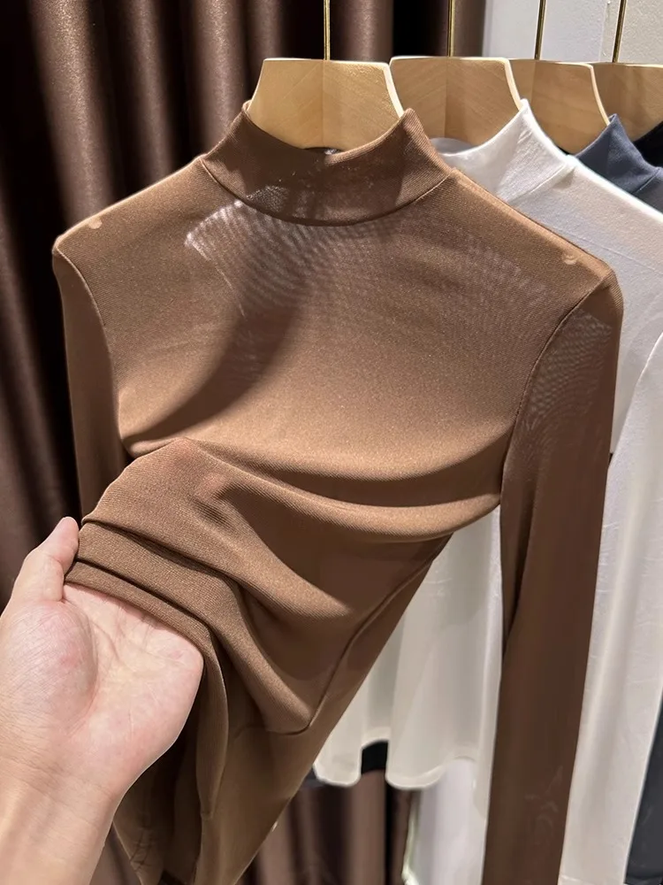 Przezroczysta, cienka, długa bluzka z wysokim kołnierzem, bazowa, damska, wiosenno-jesienna, koronkowa, elegancka, do pracy.