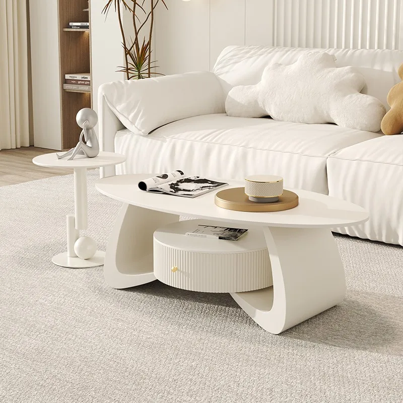 

Creative cream wind curved coffee table rock slab with drawers high-end living room light luxury high-end coffee table French cl