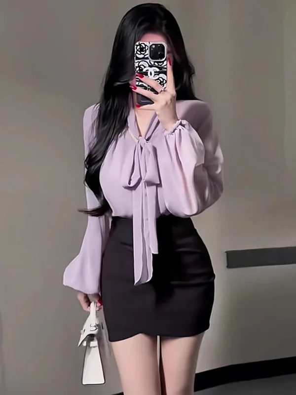 

Новинка Весна 2025: Женский топ из полиэстера свободного кроя в корейском стиле с узлом, струящимся подолом и рукавами-фонариками