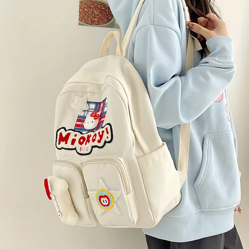 Sanrio neue Hallo Kitty Student Schult asche Cartoon niedlichen Schulter polster große Kapazität Kinder Rucksack