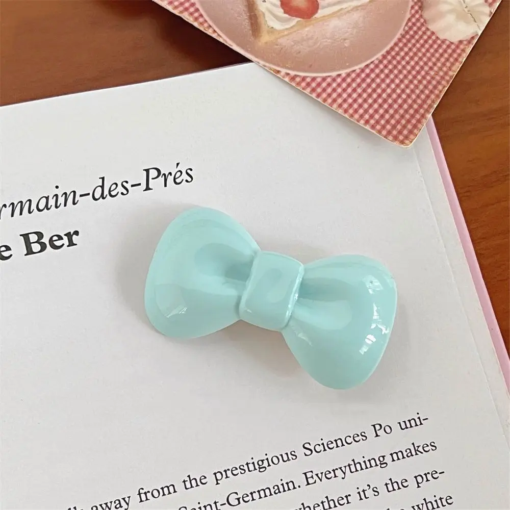 Рисунок 2 - Милая заколка для волос с бантом ярких цветов