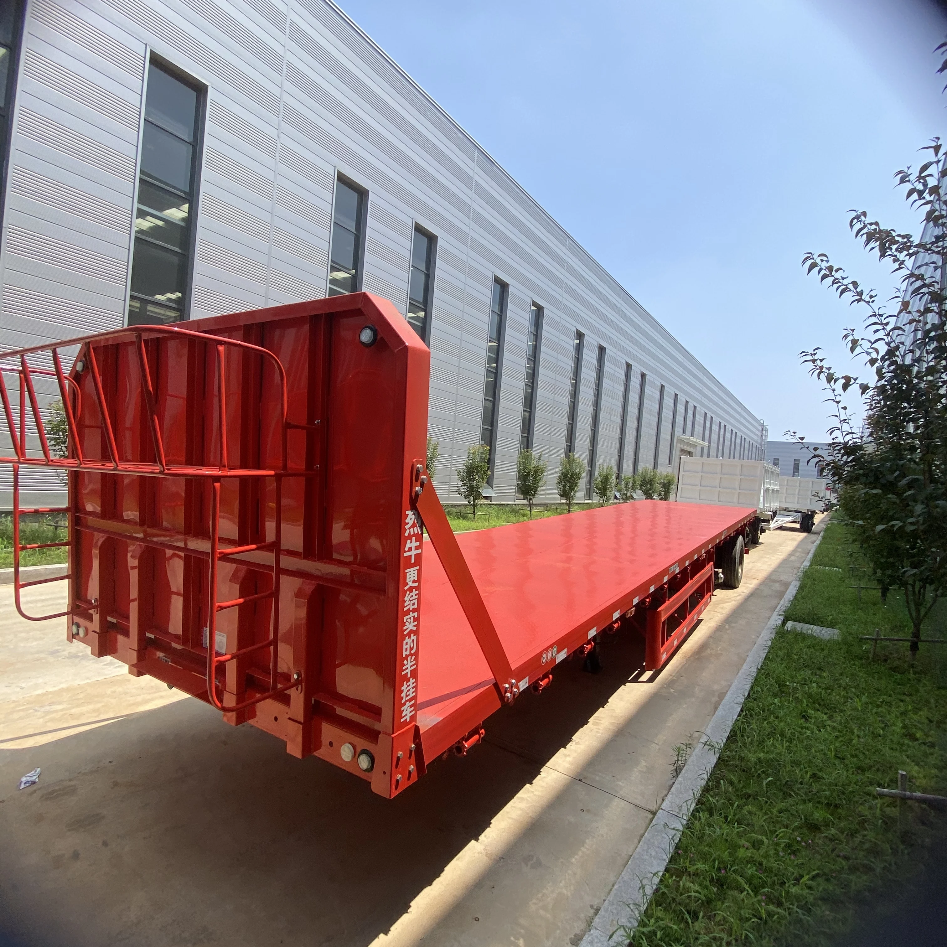 JKG45Ft 40Ft سعر المصنع نصف مقطورات فولاذية 3 محاور سرير مسطح مقطورة مسطحة للبيع