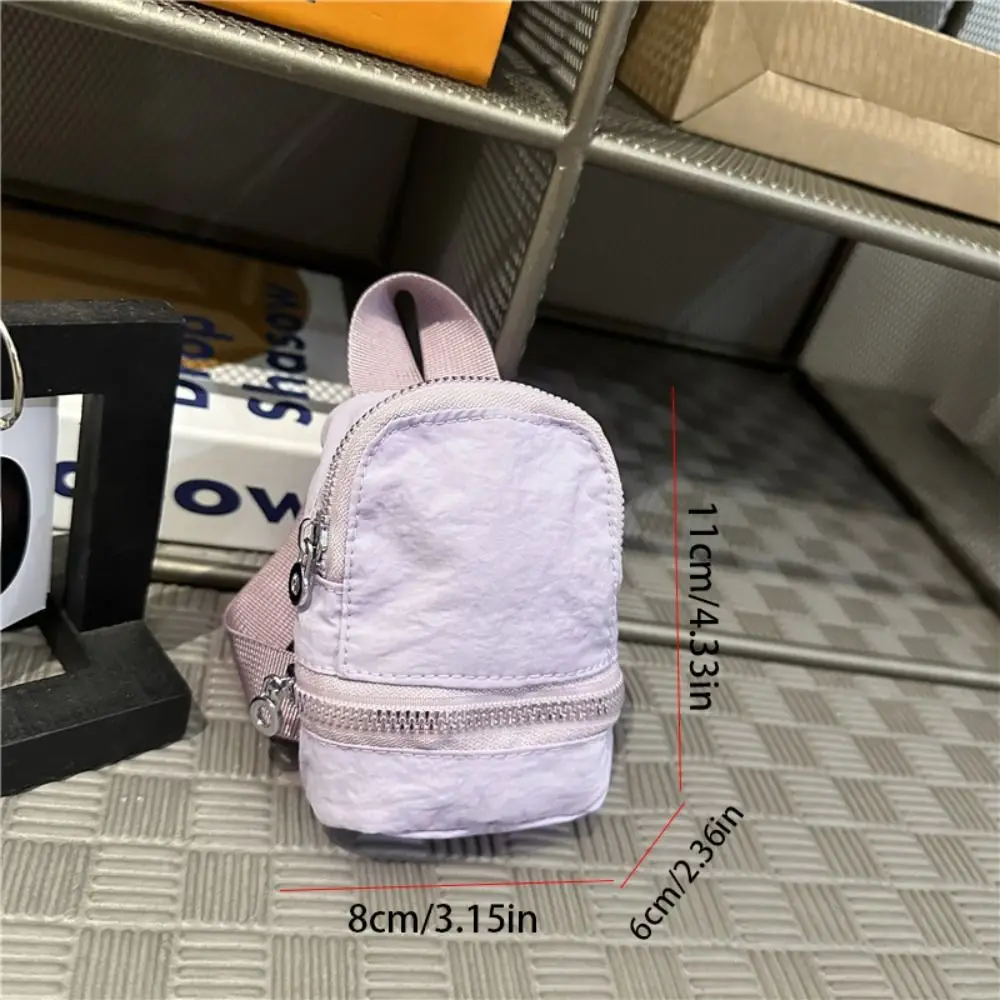Simpatica mini zaino in nylon tinta unita, mini borsa a tracolla, portafoglio piccolo, borsa da appendere in stile coreano
