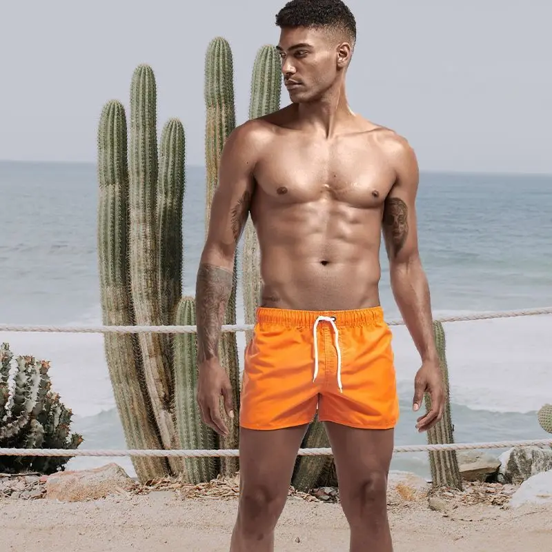 2026 Summer New Men's Fashion Casual Swimming Shorts Quick Drying Breathable Drawstring Pocket Solid Color Beach Pants