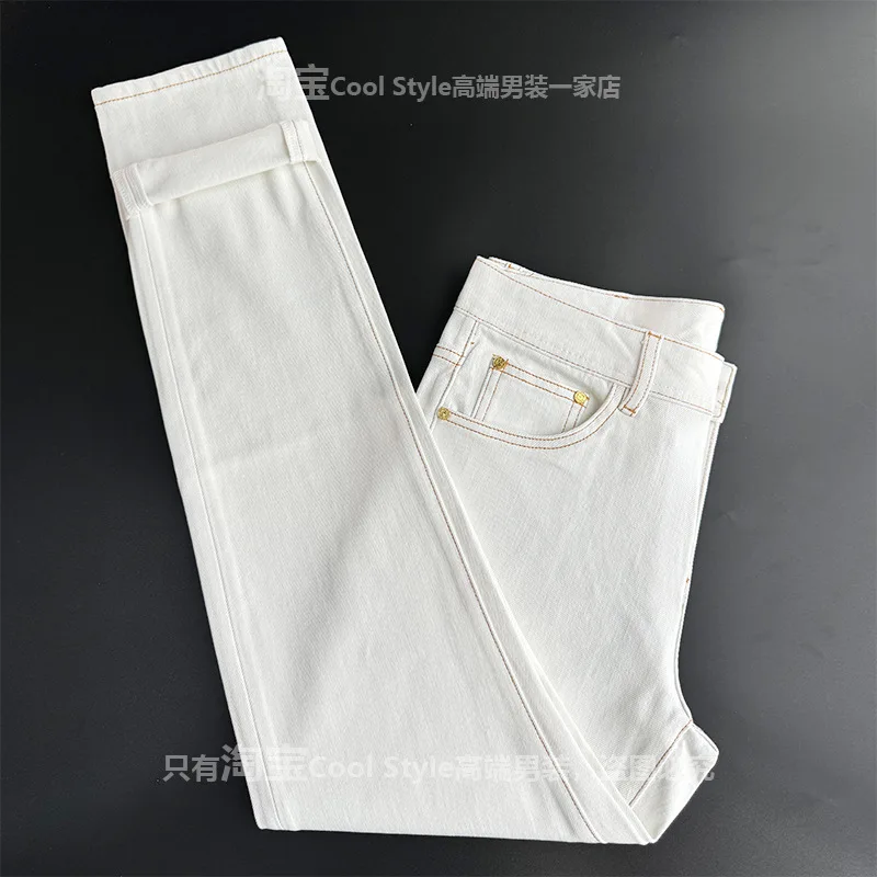 

Light luxury white jeans men's slim fit small feet 2026 autumn new trend high-end fashion long pants